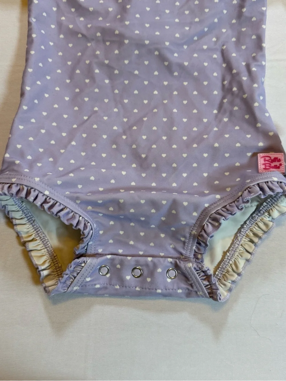 RuffleButts Girls Purple Heart Long Sleeve One Piece Swimsuit 12-18M